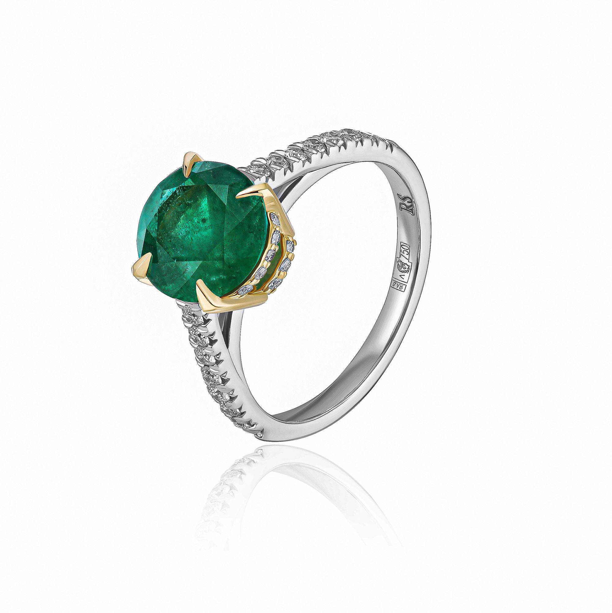 Кольцо из белого золота с бриллиантами и изумрудом 1.78 ct