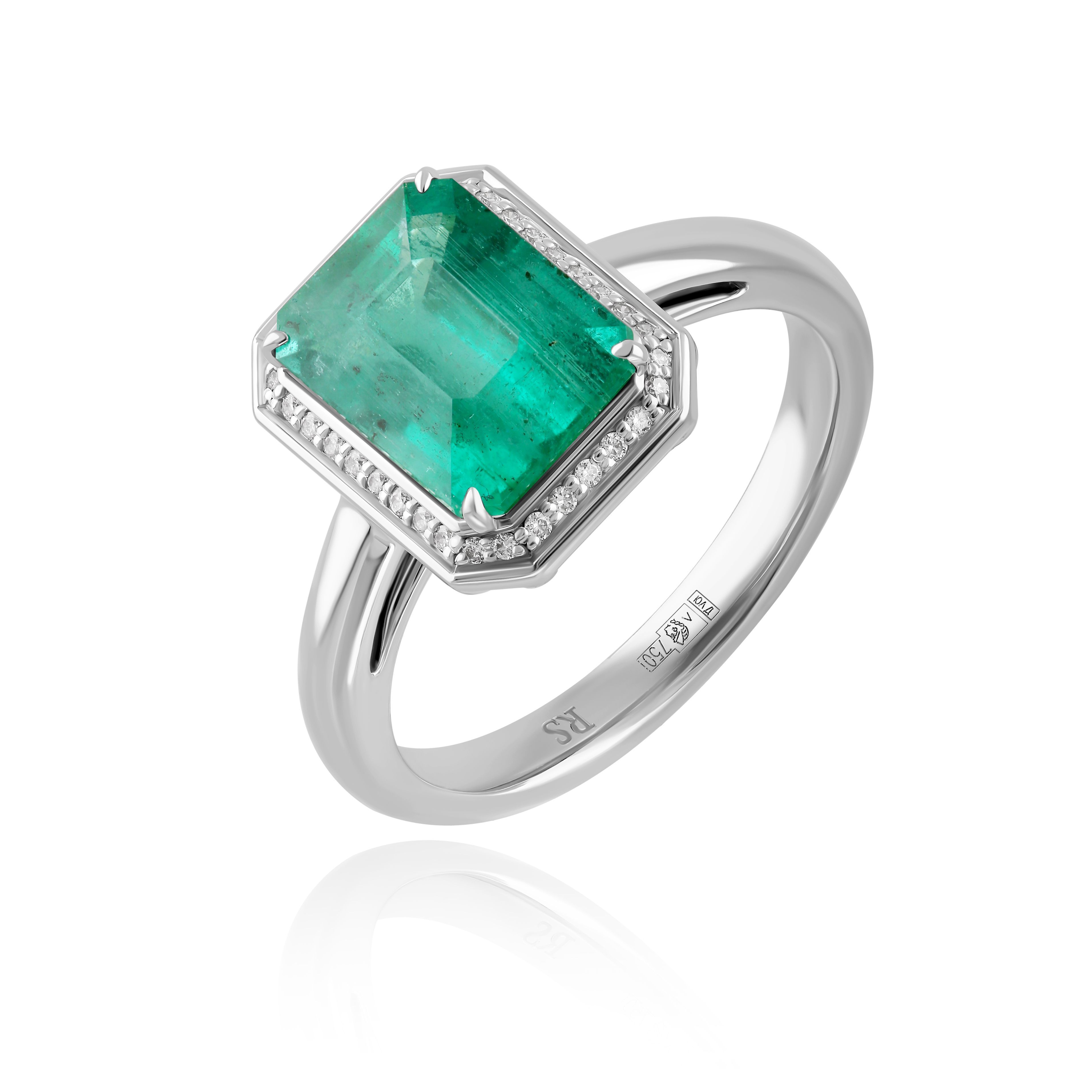 Кольцо из белого золота с бриллиантами и изумрудом 3.37 ct