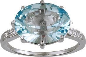 Кольцо из белого золота с бриллиантами и топазом
