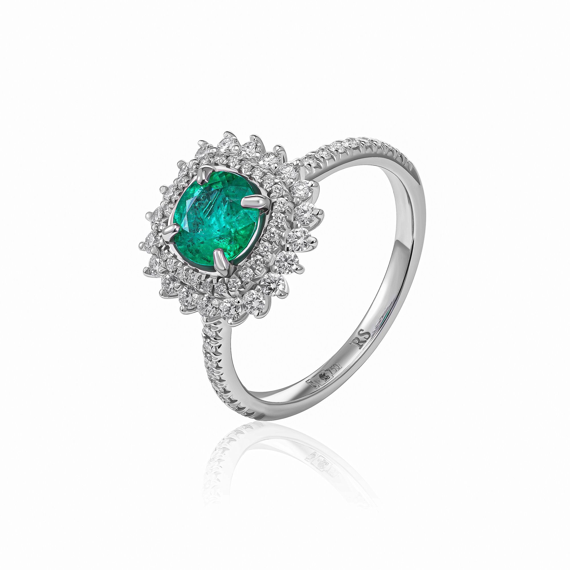 Кольцо из белого золота с бриллиантами и изумрудом 1.26 ct