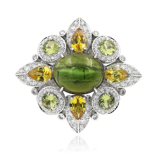 Кольцо из белого золота с турмалином 6.15 ct, бриллиантами, хризолитами и сапфирами